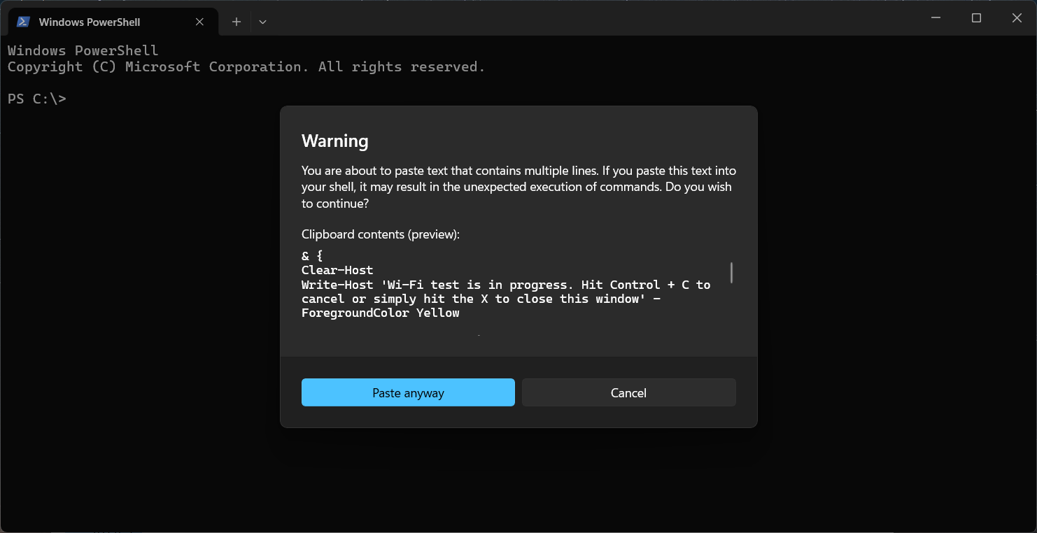 Windows PowerShell showing a warning about pasting text that contains multiple lines, with Paste anyway and Cancel buttons