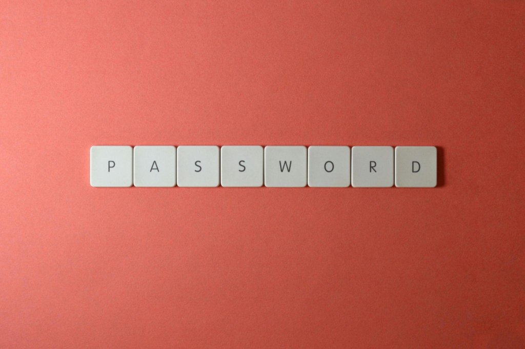 White keyboard keys spelling the word "password" on a red background.